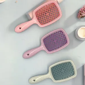 High quality wheat straw hollow out design mesh comb custom logo antistatic detangling massage hair brush for home and salon