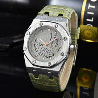 Montre à quartz classique élégante à cadran ajouré, boîtier en acier inoxydable, bracelet en caoutchouc, résistante à l'eau, aiguilles lumineuses, 33 mm – Meilleure vente