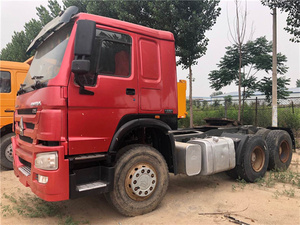 รถบรรทุกหัวลากมือสอง Sinotruk Howo NX 6x4 แบบหลังคาเรียบ พวงมาลัยซ้าย เครื่องยนต์ดีเซลยูโร 2 กำลัง 351-450 แรงม้า รับน้ำหนัก 31-40 ตัน เครื่องยนต์ Weichai สำหรับงานหนัก - Product Image 4