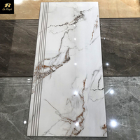 Chine karakata escalier antidérapant prix plancher en or panda carreaux de luxe en marbre blanc avec veine grise carreaux de marche en marbre blanc pour escalier