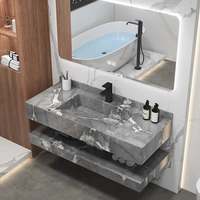 Meuble-lavabo de salle de bain sur mesure avec lavabo en dalle de roche intégré, lavabo en céramique LED intelligent et plan de travail en marbre à deux niveaux