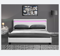 Lit plateforme double moderne et simple en similicuir blanc et noir avec LED intégrées dans la tête de lit