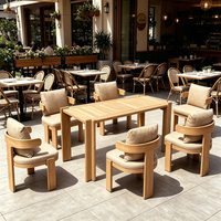 Ensemble de salle à manger d'extérieur en teck moderne et écologique, résistant aux intempéries, avec coussins imperméables, fauteuil de patio côtier, mobilier de luxe pour complexe hôtelier