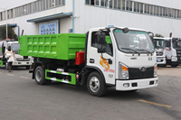 Camion à ordures compacteur Howo 7cbm 4X2, boîte de vitesses manuelle, camion à ordures hydraulique à levage par crochet