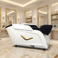 Lit de massage convertible pour salon moderne et spa, avec bac en céramique et structure robuste