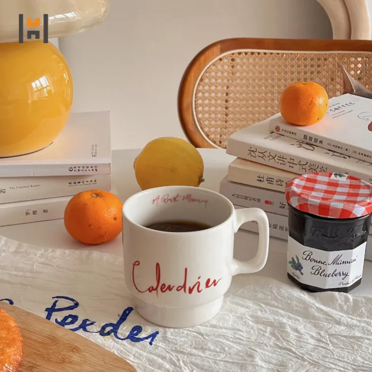 La tazza da caffè in ceramica di vendita calda personalizza la tazza da tè pomeridiano in porcellana con Logo per il regalo