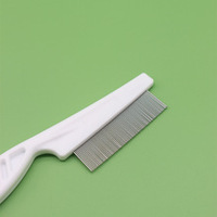 Peigne anti-puces à dents en acier inoxydable pour chien et chat Peigne de beauté Peigne pour animaux de compagnie Peigne de poils à dents fines