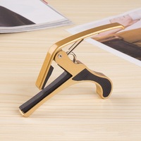 Capo de guitare en alliage de zinc de haute qualité Meilleur capo de requin acoustique pour instruments à cordes Échantillon gratuit disponible