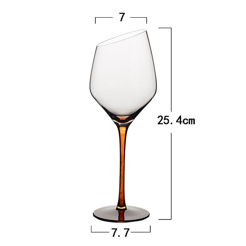 Orange ting black bottom inclined red wine glass