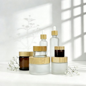 High Quality clear Frosted Face Cream Glass Jar with Bamboo <b>Cap</b> 30g 50g 60g 100g Wide-mouth Amber Body <b>Scrub</b> Cream Glass Jar - Product Image 1