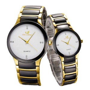 Montre à <span class=keywords><strong>quartz</strong></span> tendance avec cadran à aiguilles, bracelet en acier inoxydable incrusté de diamants, style simple et personnalisé pour couple, grand format - Product Image 1