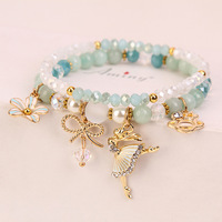 Bracelets tendance pour femmes avec breloque danseuse, perles de cristal, cordon élastique, nœud mignon et fleur de ballet