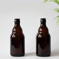 Bouteille de vin en verre foncé avec bouchon couronne pour bouteille de bière artisanale et bouteille de boisson de forme unique