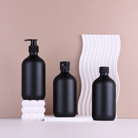 Bouteille vide de shampooing et d'après-shampooing PET écologique de luxe en gros de 500ML pompe cylindrique Lotion hydrosol noire bouteille vide