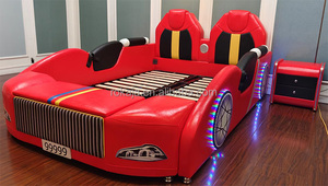 Lits pour enfants populaires en forme de voiture <span class=keywords><strong>avec</strong></span> <span class=keywords><strong>rangement</strong></span>, <span class=keywords><strong>lit</strong></span> multifonctionnel en forme de dessin animé pour enfants, <span class=keywords><strong>lit</strong></span> souple en bois et cuir de style américain, ensemble de <span class=keywords><strong>lit</strong></span> pour petite voiture - Product Image 2