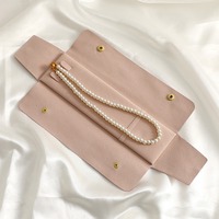 Pochette à bijoux portable en microfibre rose/gris/blanc de luxe avec logo personnalisé et fermeture à bouton pour présentoir de colliers