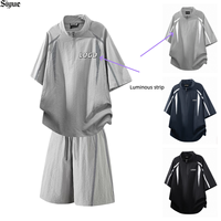 Ensemble 2 pièces sportswear technique respirant pour homme OEM/ODM – Haut léger en nylon à quart de zip et short au-dessus du genou – Style urbain streetwear