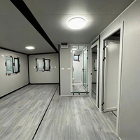 Maison conteneur extensible de luxe moderne entièrement personnalisée avec toit triangulaire, 2 chambres, cuisine, salon et salle de bain
