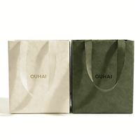 Sac d'emballage cadeau haut de gamme, personnalisation à guichet unique, sac de transport de luxe pour les achats, sac de vente au détail vert, vente en gros d'usine