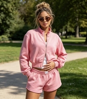 Ensemble de survêtement rose deux pièces pour femme avec logo personnalisé OEM, veste courte à col montant entièrement zippée et short de sport