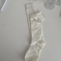 Chaussettes hautes polyvalentes en tricot noir uni respirantes et antidérapantes pour femmes, style flatteur pour les jambes, automne/hiver