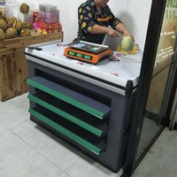 Comptoir en acier inoxydable pour magasin de proximité avec armoire métallique et étagères à trois niveaux pour les collations et les chewing-gums