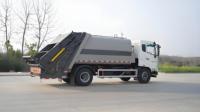Haute qualité Sinotruck Howo 12 CBM camion compacteur à ordures 4x2 Compression camion à ordures refuser les ordures véhicule de transfert de déchets