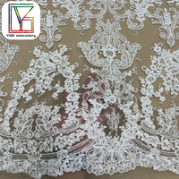 Haute qualité cordon de mariée broderie Sequin Tulle dentelle tissu lourd blanc paillettes brodé maille dentelle tissu pour robe de mariée