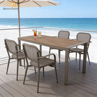 Ensemble de table et de chaises de salle à manger en bois plastique de luxe, mobilier de jardin en aluminium moderne, table et chaises d'extérieur pour restaurant