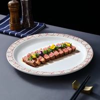 Plat de service en porcelaine blanche de luxe moderne avec bordure rouge dorée, écologique et compatible lave-vaisselle, pour mariage, banquet, table à manger à domicile