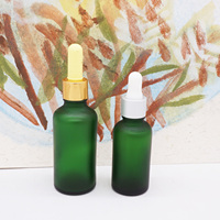 Cylindre 50ml 1.7 oz vert foncé rond cosmétique huile essentielle flacon compte-gouttes en verre