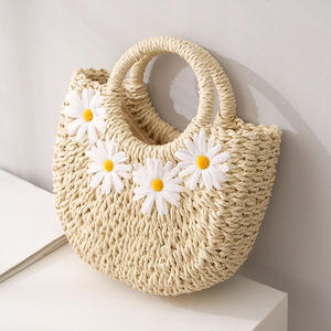 Nouveauté Sacs de plage en paille tissés à la main avec des fleurs pour le voyage des femmes - Product Image 1