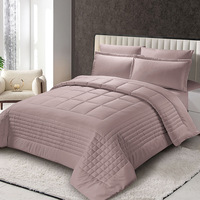 Nouveau design ensembles de literie en coton dans un sac doux et chaud avec ensemble de couette et ensemble de draps solides taie d'oreiller mode matelassée