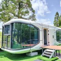 Maison mobile, cabine de vaisseau spatial, capsule spatiale, maisons modulaires, conteneur d'expédition, design de café, style resort, maison luxueuse