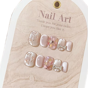 Qianya <span class=keywords><strong>Kawaii</strong></span> fait à la main oeil de chat presse sur les ongles avec des motifs d'arc de fleurs séchées 10 pièces doux élégant éclaircissant réutilisable <span class=keywords><strong>faux</strong></span> ongles - Product Image 1