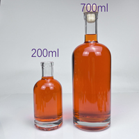 Bouteille en verre ovale transparente vide en gros, forme pilule, avec bouchon en liège en bois pour emballage cadeau de whisky et de liqueur