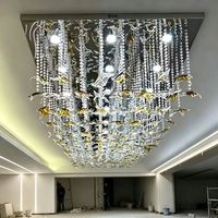 Lustre rectangulaire en verre étoile à quatre branches avec base en acier inoxydable, suspension LED à trois couleurs et intensité variable pour hall d'hôtel et décoration artistique