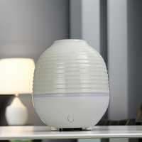 Meilleure vente 100ml blanc céramique électrique diffuseur d'huiles essentielles ultrasons USB humidificateur d'air diffuseur parfumé