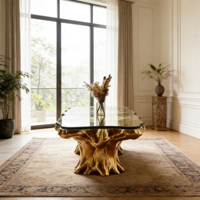 Table basse moderne de luxe en verre noir avec base en fibre de verre dorée pour salons contemporains