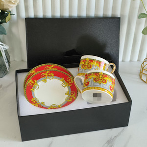 Gran oferta taza de café platillo pareja cabeza dorada personalidad creativa juegos de tazas y platos con caja de regalo - Product Image 1