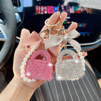 Breloque de sac de style créateur, petite pochette parfumée, autocollant style Ins, cordon à diamants, porte-clés de sac à main avec diamants simulés, design de niche