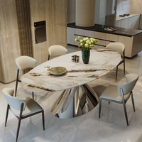 Table à manger ovale en pierre frittée avec 4 chaises et pieds robustes en acier au carbone pour hôtel, villa, maison et restaurant, usage quotidien