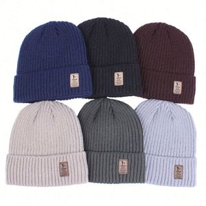 หมวกไหมพรมบุขนแกะสำหรับผู้ชาย สีพื้น ปักโลโก้ตามสั่ง สำหรับฤดูหนาว ป้องกันความหนาวเย็นบริเวณหู เหมาะสำหรับปั่นจักรยาน - Product Image 1