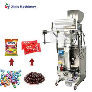 Machine d'emballage multifonctionnelle à purge d'azote pour sachets de chocolat, <span class=keywords><strong>Nutella</strong></span>, biscuits, bonbons gélifiés, barbe à papa, popcorn, chewing-gum et fruits secs - Product Image 1