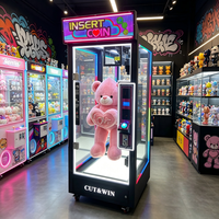 Machine distributrice d'arcade personnalisable pour la vente en gros, avec lumière d'ambiance LED colorée, pour la distribution de jouets en peluche à thème de coupe de cheveux et de ciseaux