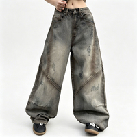 Pantalon en jean délavé effet dégradé avec patchwork à lames courbes, coupe droite ample, style streetwear, taille haute, jambe large