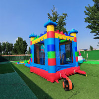 Structure gonflable d'extérieur modulable, château gonflable commercial personnalisé avec toboggan aquatique pour la location