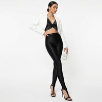 Leggings noirs brillants pour femme, taille haute, extensibles, coupe skinny, avec bride de cheville, pour club et soirée