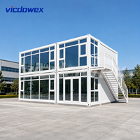 VICDOWEX Maison conteneur préfabriquée modulaire à deux étages, design Asie du Sud-Est, avec murs en panneaux sandwich pour entrepôt