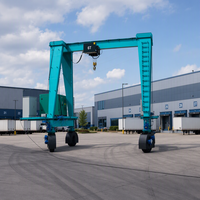 Grue à portique robuste à pneus en caoutchouc pour le levage de matières premières sur un grand chantier de construction civile